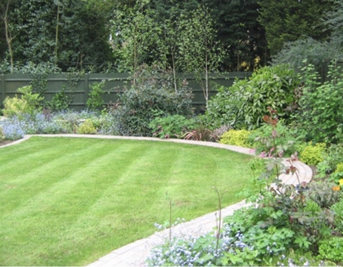 Pauls Landscapes garden services Berkshire landscaped lawn and pathway.