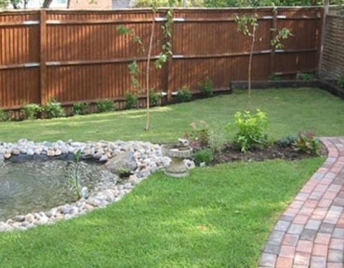 Landscaped garden with new lawn and fencing.