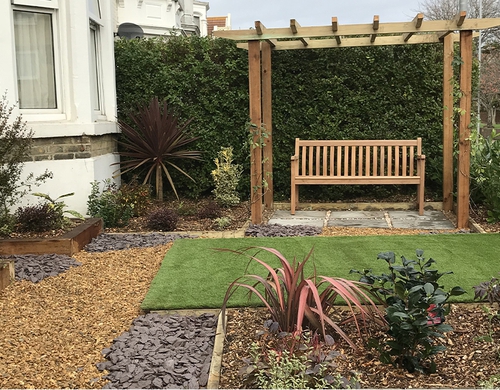 Pergola and Astroturf landscaped front garden.